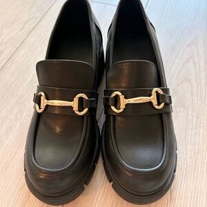 Sleek Black Loafers with Gold Detail